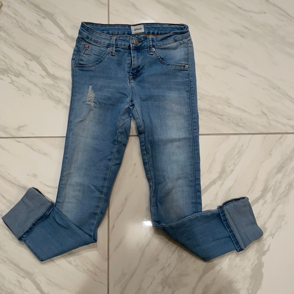 Girls Hudson distress jagging jeans.
